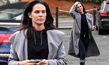 Danielle Lloyd cuts a casual figure in a long grey coat and skinny jeans as she braves Storm Ciara 