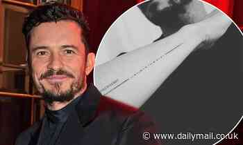 Orlando Bloom gets his son Flynn's name tattooed in Morse code across his arm 