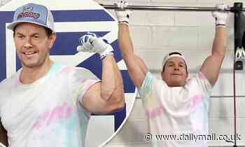Mark Wahlberg flaunts his bulging biceps as he completes grueling workout