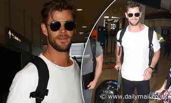Chris Hemsworth is mobbed by fans for selfies as he jets into Sydney - Daily Mail