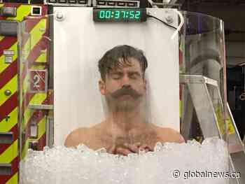 Edmonton firefighter spends an hour in ice to raise money for muscular dystrophy