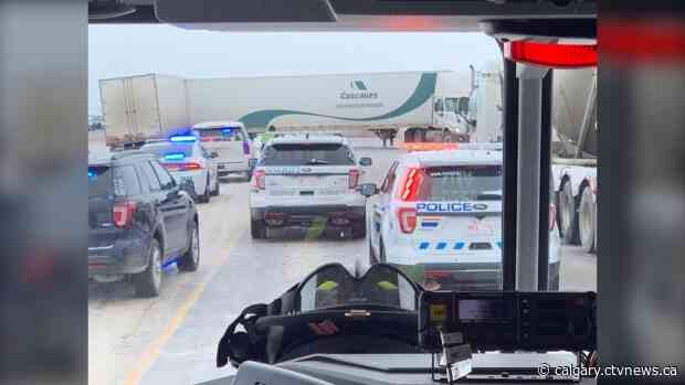 Southbound QEII reopens near Bowden after semi tractor-trailer jackknifed