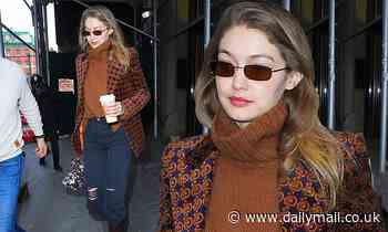 Gigi Hadid rocks ripped jeans and crocodile cowboy boots during New York Fashion Week