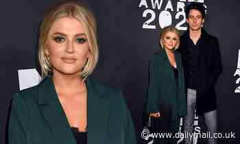 Lucy Fallon cuts an elegant figure as she cosies up to boyfriend Tom Leech at the NME Awards