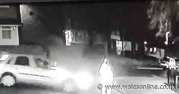 Watch - shocking moment man is struck by car and left lying in the road
