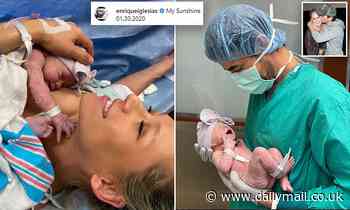 Anna Kournikova and Enrique Iglesias show off new baby girl