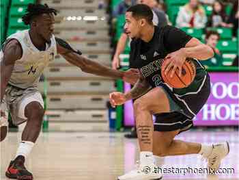 Wherever Huskies' JT Robinson dribbles, he takes his mom and granny with him