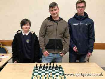 Youngsters take on chess master