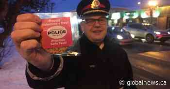 Edmonton police hand out Valentine’s cookies to ‘Practise Safe Text!’ and avoid distracted driving