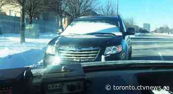 Motorist driving with snow-covered windshield pulled over by cops