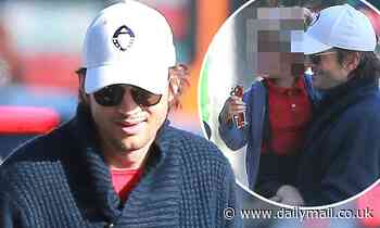 Ashton Kutcher looks like a doting dad as he spends Valentine's Day with his little boy Dimitri