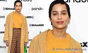 Zoe Kravitz stands out in a yellow coat as she continues to promote her new series