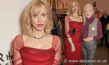 Courtney Love looks chic in a red chiffon sheer dress as she attends Vivienne Westwood LFW event