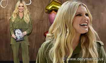 Jessica Simpson rocks an olive green jumpsuit at Open Book signing in Nashville