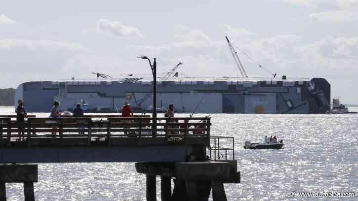 Salvage firm asks judge to halt rival's removal of capsized ship and its 4,200 cars