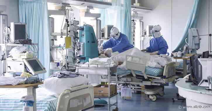 China reports major drop in new virus cases; 143 new deaths