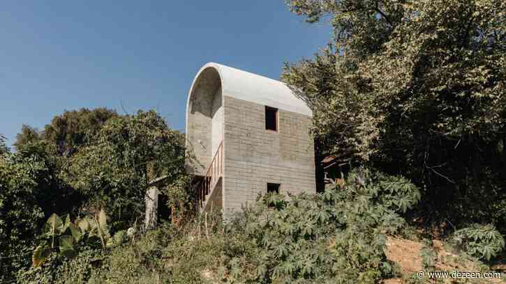 Vaulted concrete roof tops brick house Casa Martha by Naso