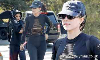 Kourtney Kardashian embraces sporty chic as she stops by the Calabasas farmers market with son Mason