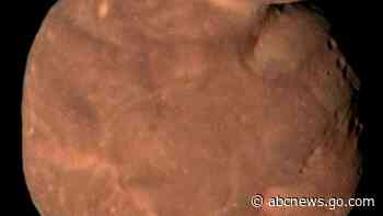 NASA's space snowman reveals secrets: few craters, no water