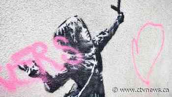 Banksy's Valentine's Day mural covered after it was defaced