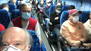 Americans to fly home from coronavirus-hit cruise; China says new cases slowing