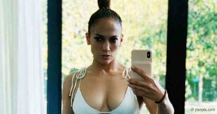 Jennifer Lopez Shows Off Her Toned Abs in White Bikini: 'Relaxed and Recharged'