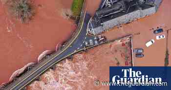 Storm Dennis: huge waves and flooded roads in England and Wales – video - The Guardian