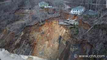 House slides off bluff in historic floods