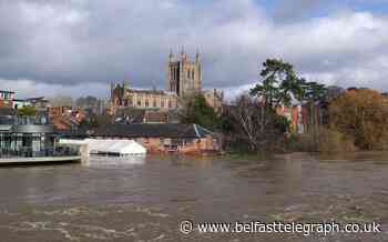 Woman swept away by floodwater is found dead