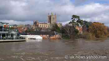 Woman swept away by floodwater is found dead