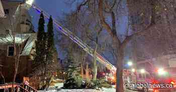 Crews battle two-alarm fire at abandoned home near Alberta legislature - Global News