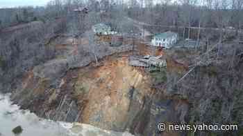 Tennessee flooding: 'Unprecedented' floods make homes slide into river