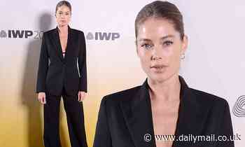 Doutzen Kroes cut a sophisticated chic look in a simple black suit