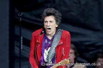 Ronnie Wood stuns fans by taking the Tube to the Brits - Warrington Guardian