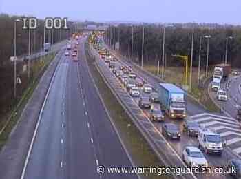 Delays on M62 in Warrington after lane closed