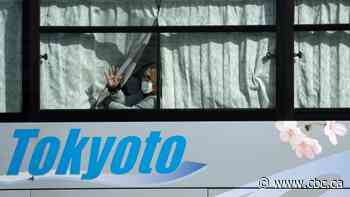 Cruise passengers start to disembark in Japan as 2-week virus quarantine ends