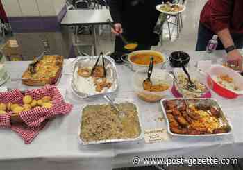 Potluck dinner offers a neighborly welcome to longtime and new residents.