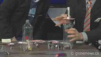 Science teacher Michael Ng having fun with inertia