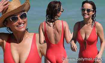 Giada de Laurentiis, 49, looks toned in a plunging red swimsuit as she splashes around in Miami