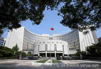China cuts benchmark lending rate to prop up virus-hit economy