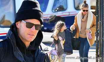 Gisele Bundchen looks stylish in winter look as she touches down in New York City with family