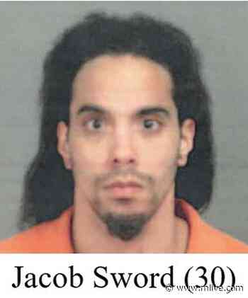 Man accused of robbing teacher at knifepoint outside Flint school - MLive.com