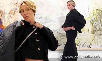 Chloe Sevigny flaunts her bare baby bump in a cropped blouse during trip to the Museum of Modern Art