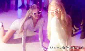 Paris Hilton writhes around on the floor as she shows off her sexiest dances moves at 39th birthday