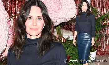 Courteney Cox sports a dusty navy blue leather skirt at the swanky birthday bash for Eric Buterbaugh