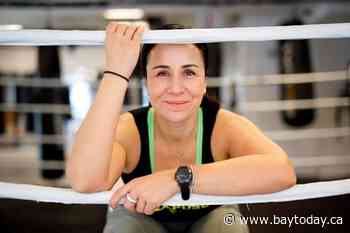Raposo fashioned her love of boxing into career as rare female ring announcer