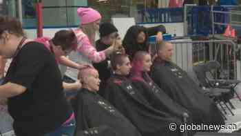 Pink hair flying at WEM in support of sick kids in Alberta