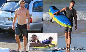 Chris Hemsworth shows off his muscles as he takes children for an after-school surfing session - Daily Mail