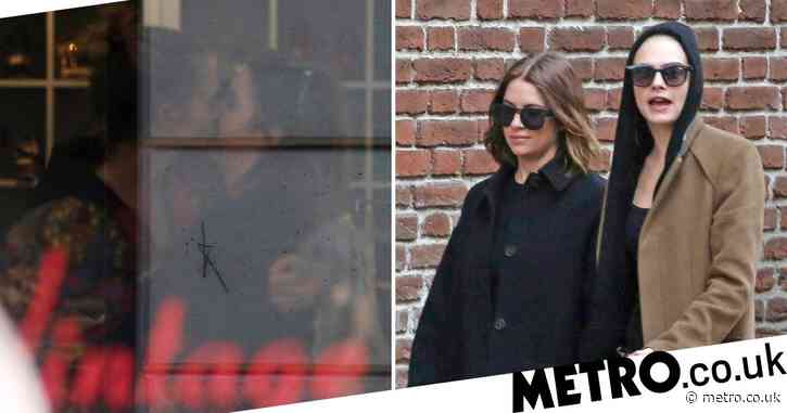 Cara Delevingne brushes off Justin Bieber drama as she enjoys a bit of PDA with Ashley Benson