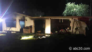 No one injured in storage building fire behind Visalia home